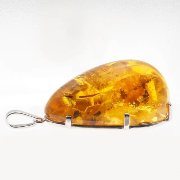 Bursztyn ze szczątkami roślinnymi i srebro rodowane - duża zawieszka