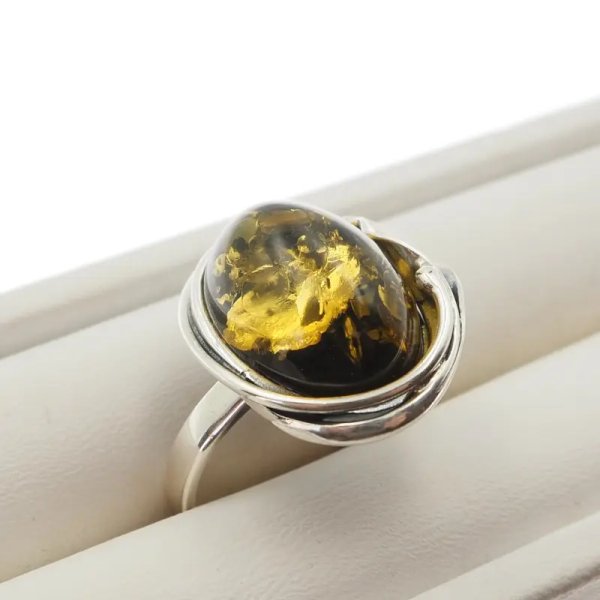 Zielony Bursztyn i srebro oksydowane - pierścionek owal z liściem