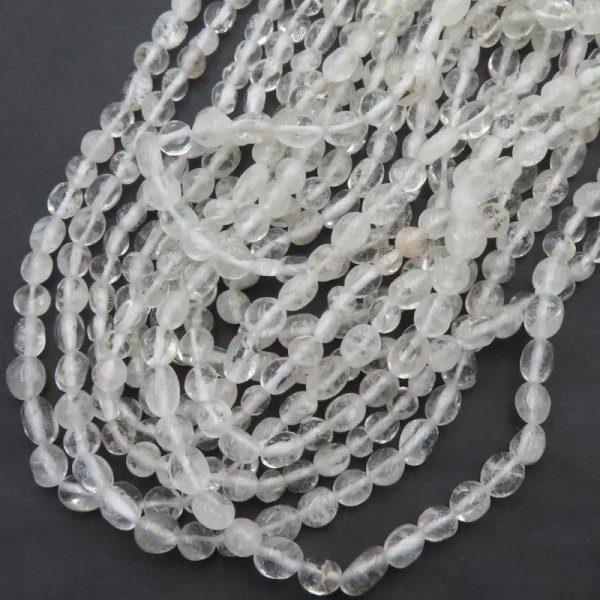 Kryształ górski pastylki nieregularne – sznur ok. 38 cm