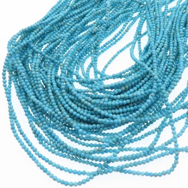 Turkus (howlit) kulka polerowana 2 mm – sznur ok. 39,5 cm (błękitny)