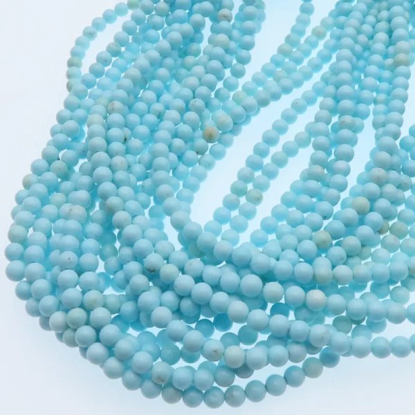 Turkus (howlit) kulka polerowana 4mm - błękitny (sznur)