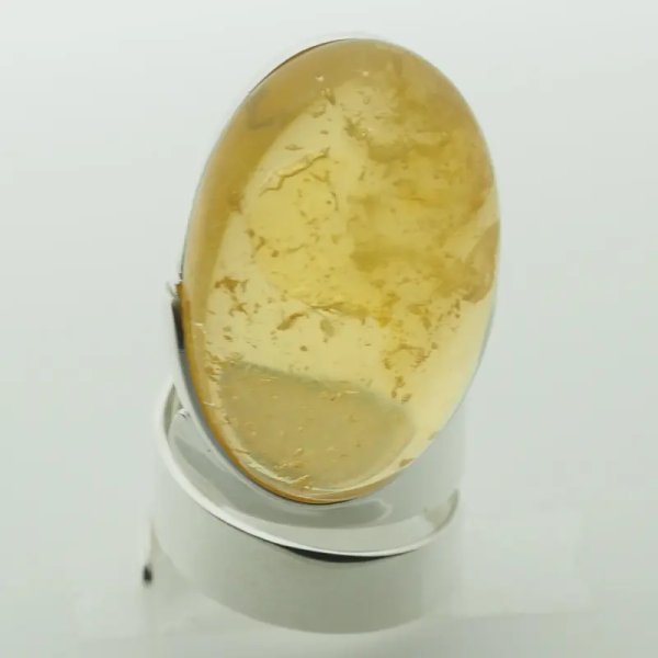 Przezroczysty Bursztyn owalny i srebro - pierścionek regulowany (Rozmiar Jubilerski 17)