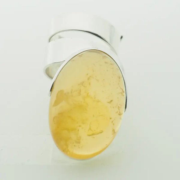 Przezroczysty Bursztyn owalny i srebro - pierścionek regulowany (Rozmiar Jubilerski 17)