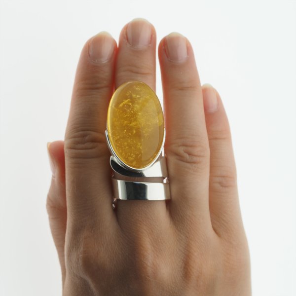 Przezroczysty Bursztyn owalny i srebro - pierścionek regulowany (Rozmiar Jubilerski 17)