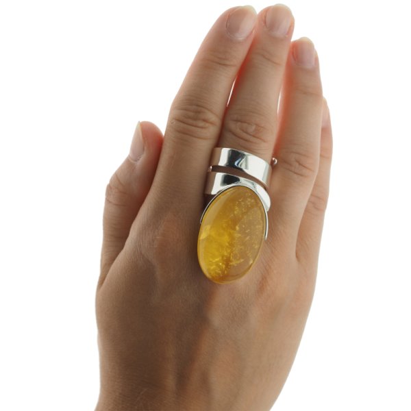 Przezroczysty Bursztyn owalny i srebro - pierścionek regulowany (Rozmiar Jubilerski 17)