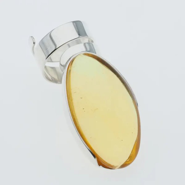 Przezroczysty Bursztyn owalny i srebro - pierścionek regulowany (Rozmiar Jubilerski 15)