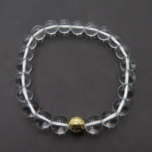 Kryształ Górski kulki i srebro złocone - bransoleta 18 cm