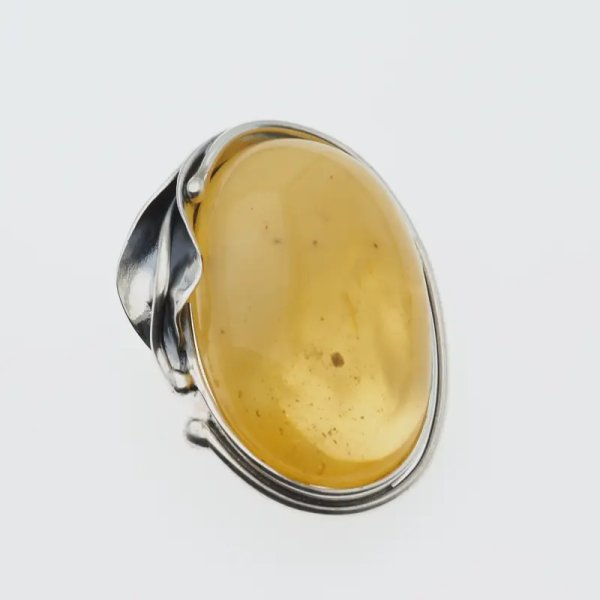 Mleczno-przezroczysty bursztyn i srebro oksydowane - broszka
