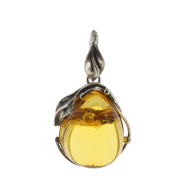 Przezroczysty bursztyn z szczątkami roślinnymi  i srebro oksydowane - wisiorek