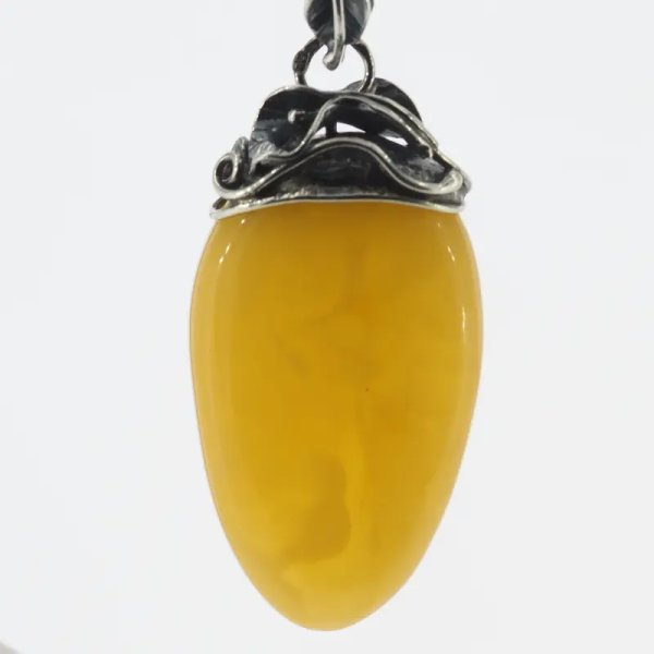 Żółty bursztyn i srebro oksydowane - zawieszka