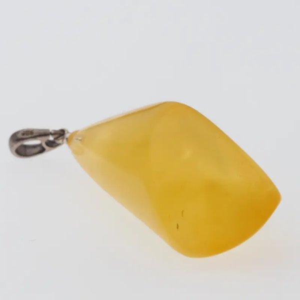 Bursztyn przezroczysty z chmurami i srebro oksydowane - zawieszka