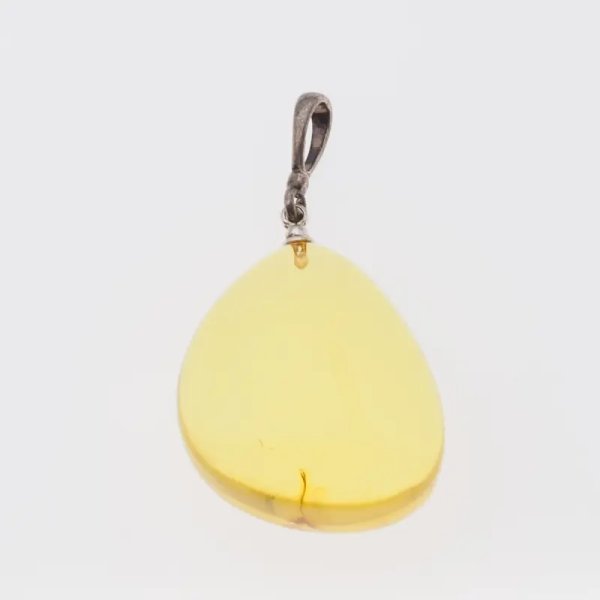 Bursztyn przezroczysty, szczątki roślinne i srebro oksydowane - zawieszka łza