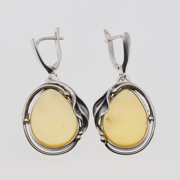 Przezroczysty Bursztyn w srebrze oksydowanym - kolczyki łzy z liśćmi