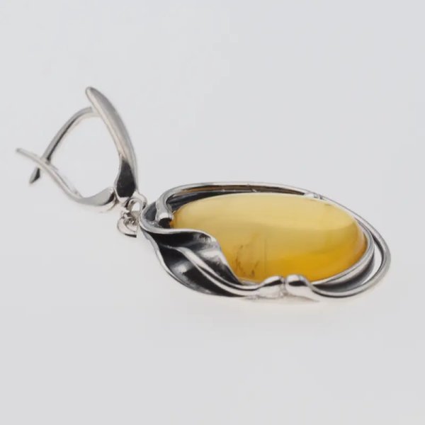 Przezroczysty Bursztyn w srebrze oksydowanym - kolczyki łzy z liśćmi