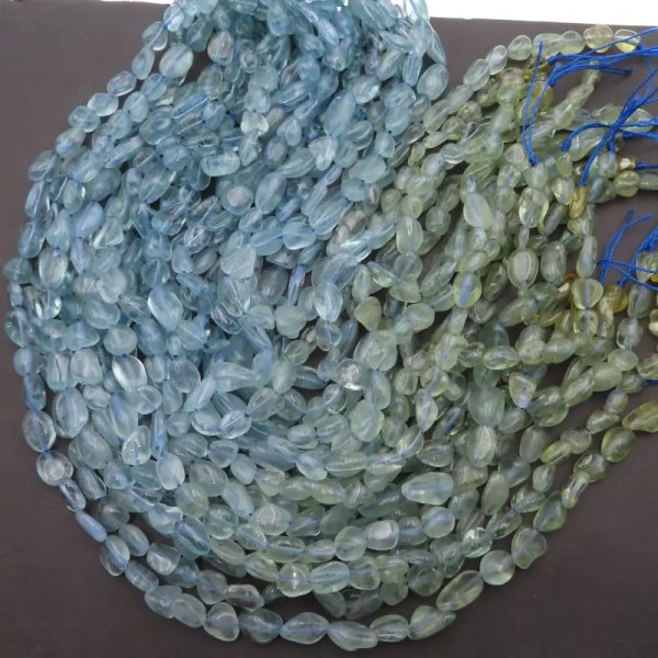 Akwamaryn pastylki nieregularne – sznur ok. 38 cm