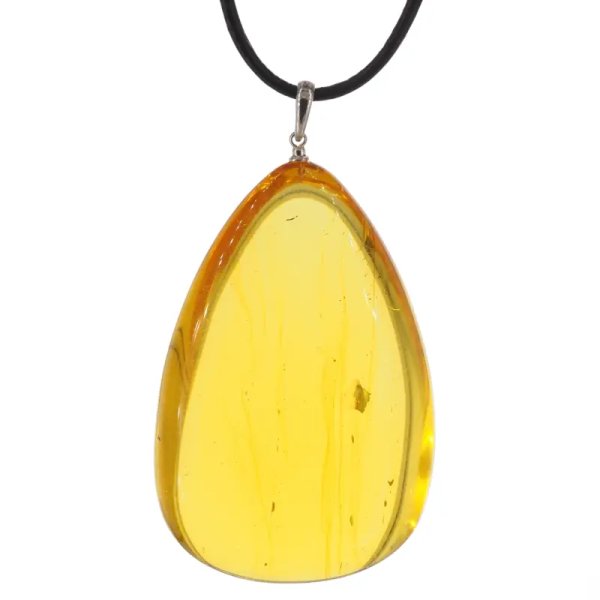 Transparentny bursztyn i srebro - naszyjnik na rzemieniu