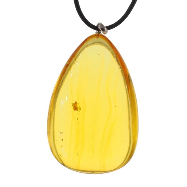 Transparentny bursztyn i srebro - naszyjnik na rzemieniu