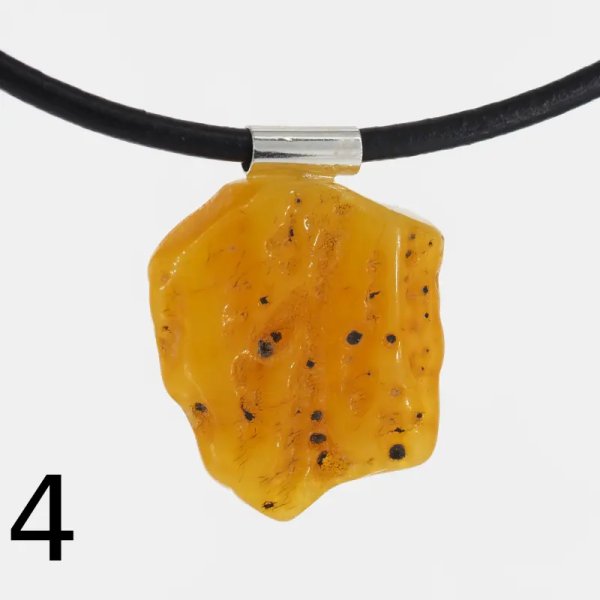 Surowy Naturalny Bursztyn mleczny i srebro - naszyjnik na rzemieniu (różne kamienie)