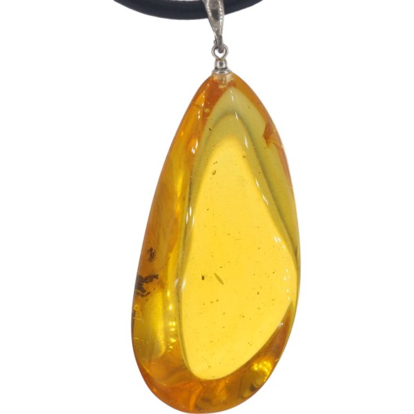 Bursztyn z inkluzją i srebro - zawieszka z rzemieniem