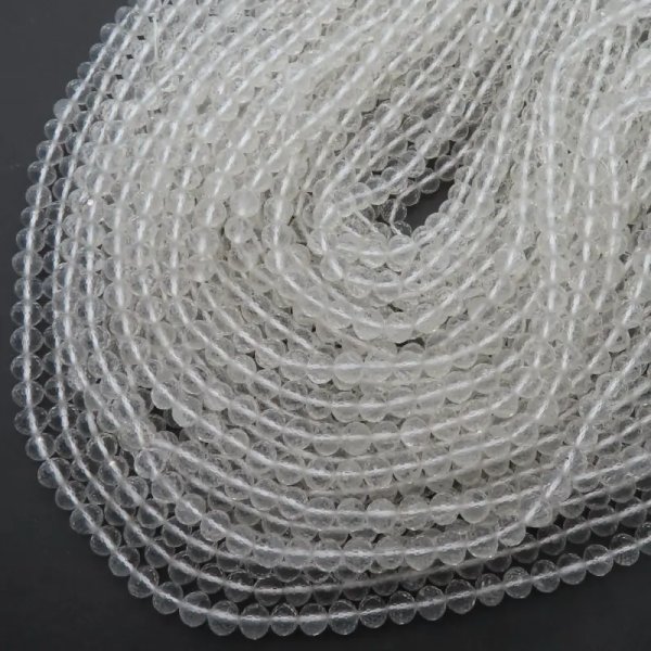 Kryształ górski fasetowany - kulki 6-6,5mm (sznur) 