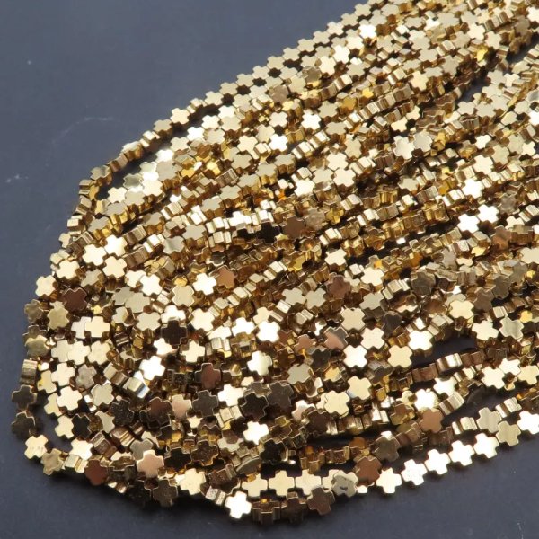 Hematyt złocony AU krzyż 4 mm (sznur)