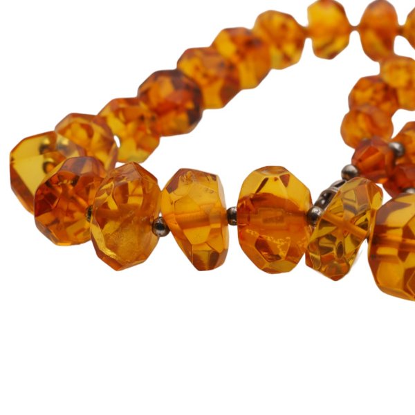 Bursztyn - walce fasetowane - korale i srebro 