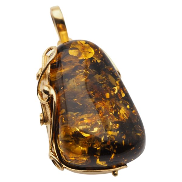 Zielony bursztyn z łuskami i srebro złocone - zawieszka z liśćmi