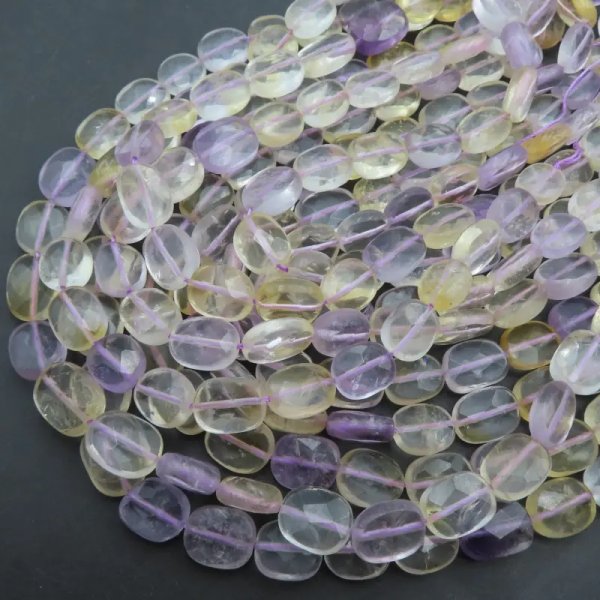 Ametryn fasetowany - owal 12x14-16 mm (sznur)