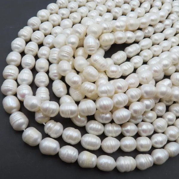 Perły Naturalne Hodowane białe ryż 10-11 mm nr 215 (sznur)