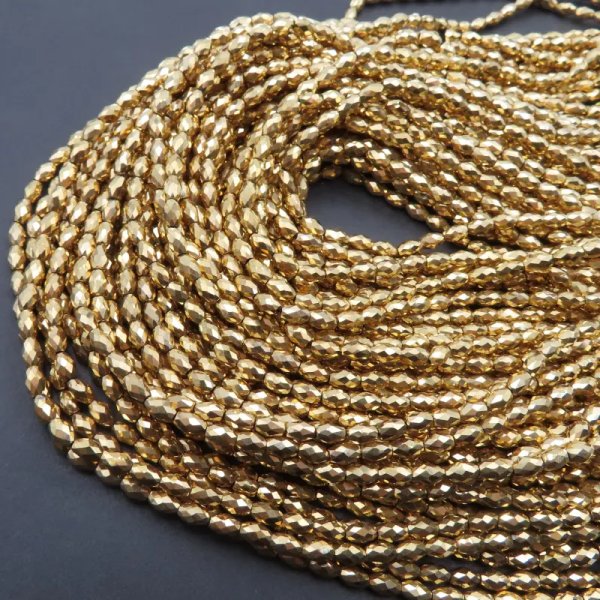 Hematyt złocony AU fasetowany ryż 3x5 mm (sznur)