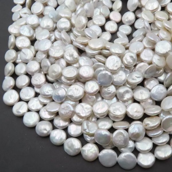 Perły Naturalne Hodowane białe pastylki 11-12 mm nr 273 (sznur)