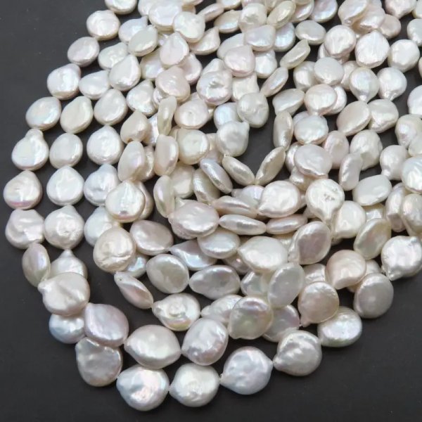 Perły Naturalne Hodowane białe pastylki 10-11 mm nr 281(sznur)