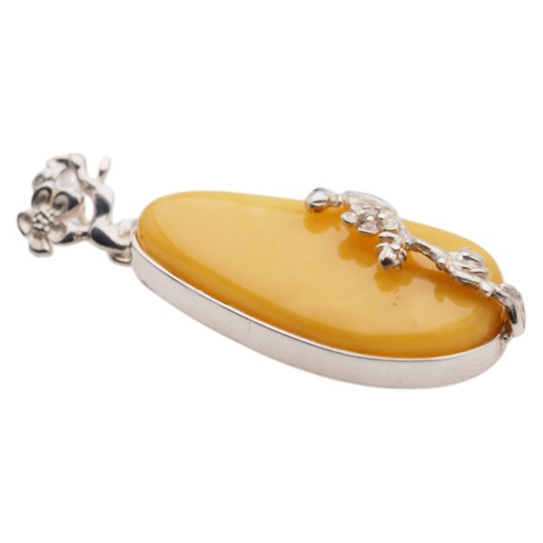 Mleczny Bursztyn i srebro - zawieszka łza z kwiatem