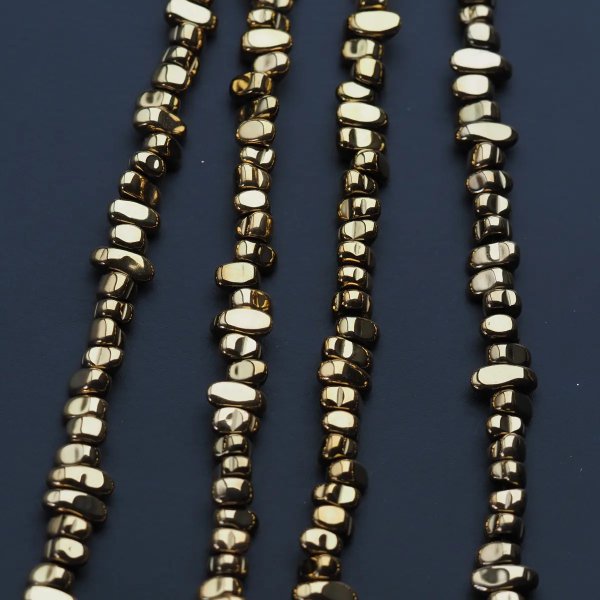 Hematyt złocony AU kropla 8x3 mm (sznur)