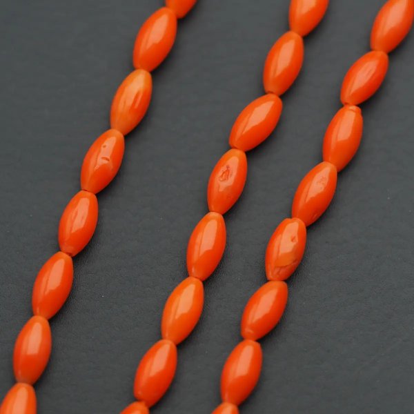 Koral ciemny pomarańczowy ryż 8x4 mm (sznur)