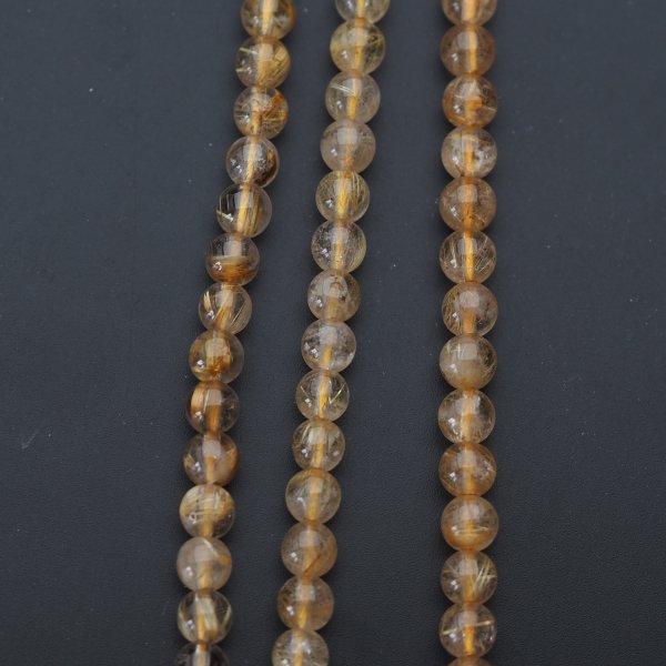 Kwarc rutylowy ze złotą nitką kula 5 mm (sznur)