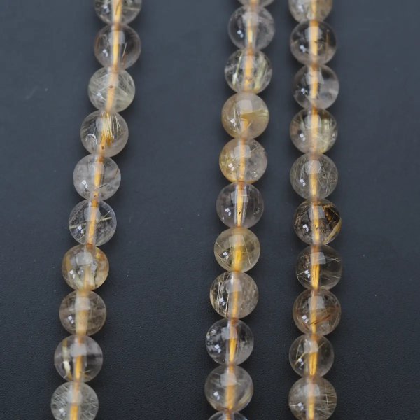 Kwarc rutylowy ze złotą nitką kula 6,2 mm (sznur)