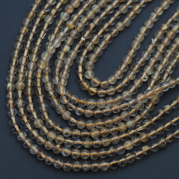 Kwarc rutylowy ze złotą nitką kula 4 mm (sznur) wysoka jakość