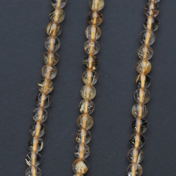 Kwarc rutylowy ze złotą nitką kula 4 mm (sznur) wysoka jakość