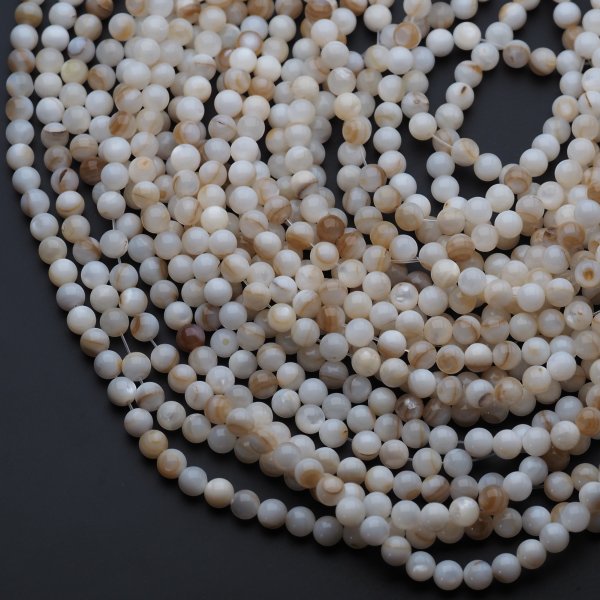 Muszla beżowa jasna - polerowane kulki 6 mm (sznur)