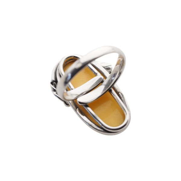 Mleczny Bursztyn w srebrze oksydowanym - pierścionek owal z liściem (Rozmiar 18) z regulacją