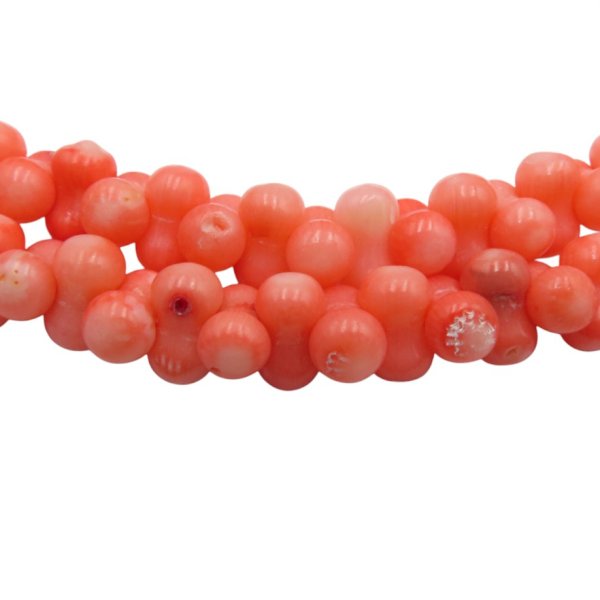 Koral różowy kości 6x10 (sznur 40 cm)