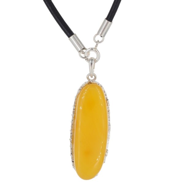 Zawieszka z mlecznym bursztynem – srebro 925, ręcznie wykonana, motyw kwiatów