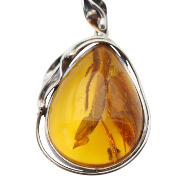 Zawieszka z bursztynem bałtyckim – ręcznie wykonana, srebro oksydowane 925, motyw liści