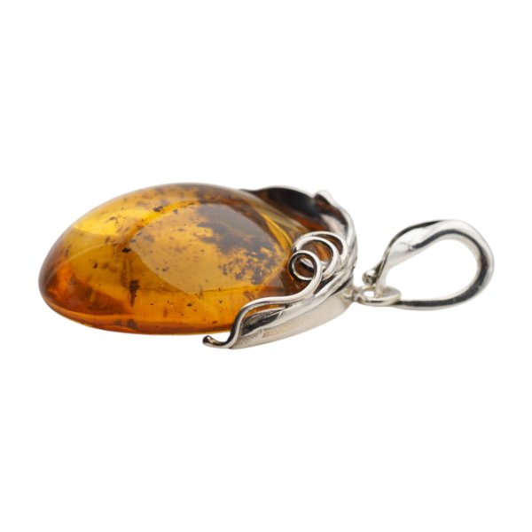Zawieszka z bursztynem bałtyckim – srebro oksydowane 925, kształt okrąg