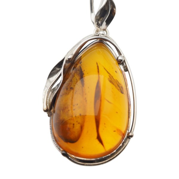 Zawieszka z bursztynem bałtyckim z inkluzjami – ręcznie wykonana, srebro oksydowane 925, kształt łzy