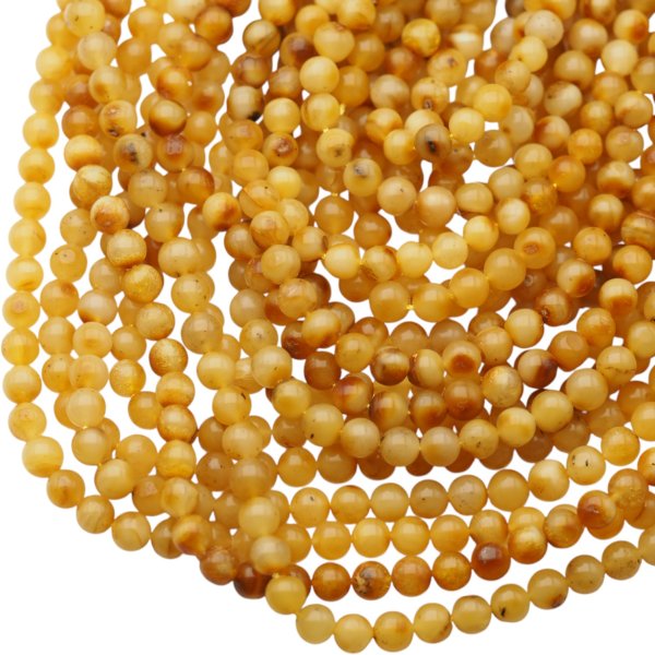 Bursztyn mleczno-brązowy polerowany kulka 6 mm (sznur 41 cm)