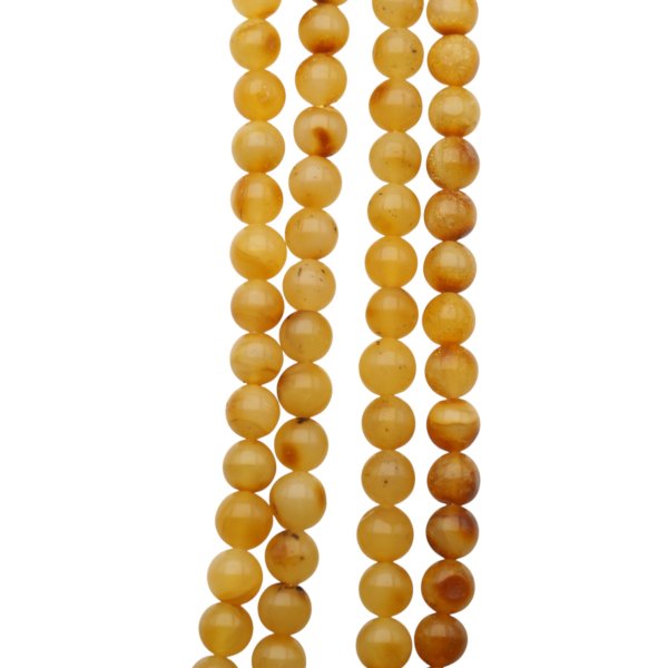 Bursztyn mleczno-brązowy polerowany kulka 6 mm (sznur 41 cm)