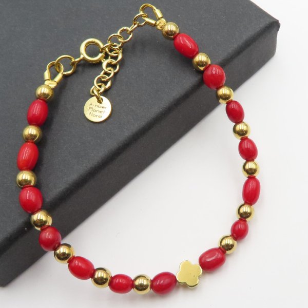 Koral czerwony, hematyt i srebro złocone - bransoletka