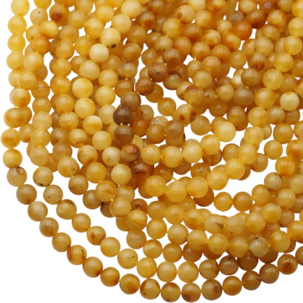 Bursztyn mleczno-brązowy polerowany kulka 6,5-7 mm (sznur 40 cm)